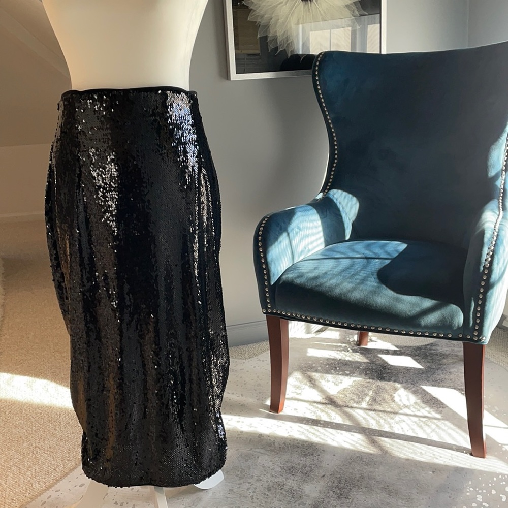 Black sequence pencil midi skirt. Excellent condition. Size Large 10/12